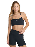 Black strappy sports bra featuring RVCA chest print. Front View