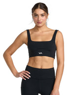 Black sports bra with a white 'VA' logo on the front. Front View