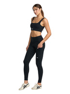 Black sports bra with a white 'VA' logo on the front. Front Side Full Body View