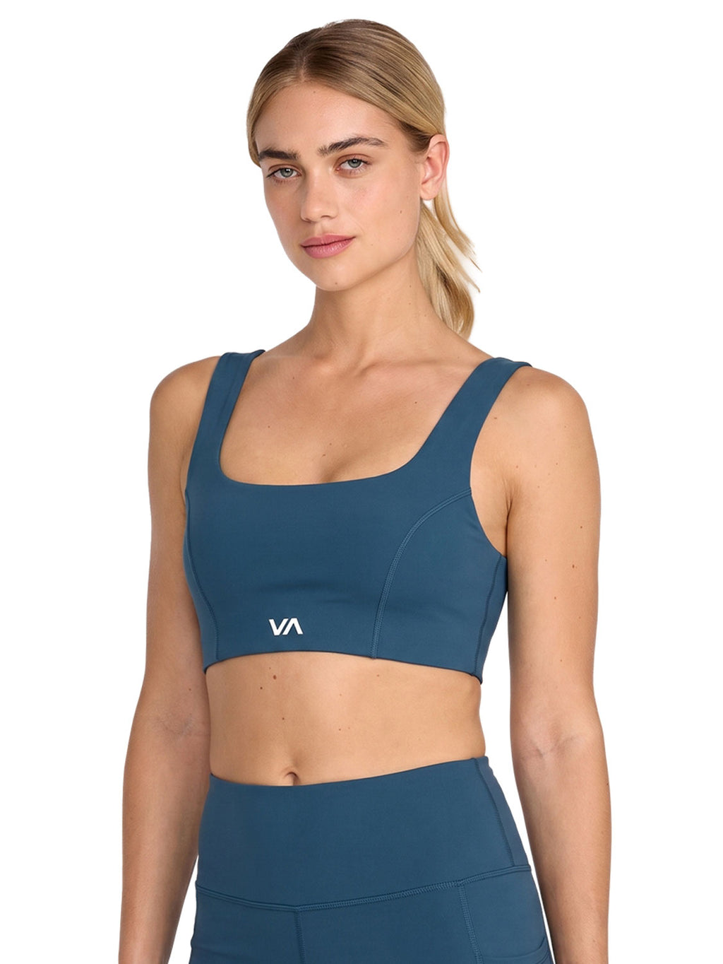 Blue sports bra with a white 'VA' logo on the front. Front View