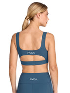 Blue sports bra with a cutout. Featuring RVCA print. Back View