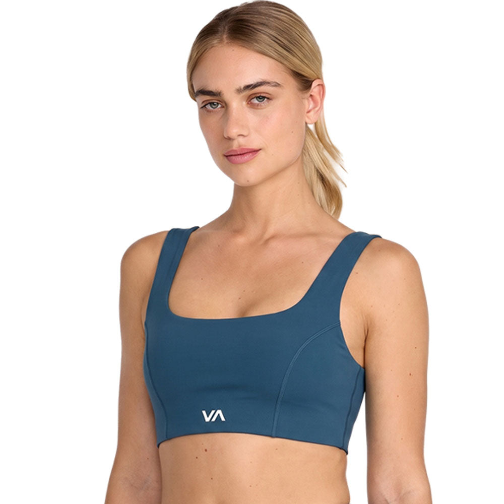 Blue sports bra with a white 'VA' logo on the front. Front View