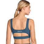 Blue sports bra with a cutout. Featuring RVCA print. Back View