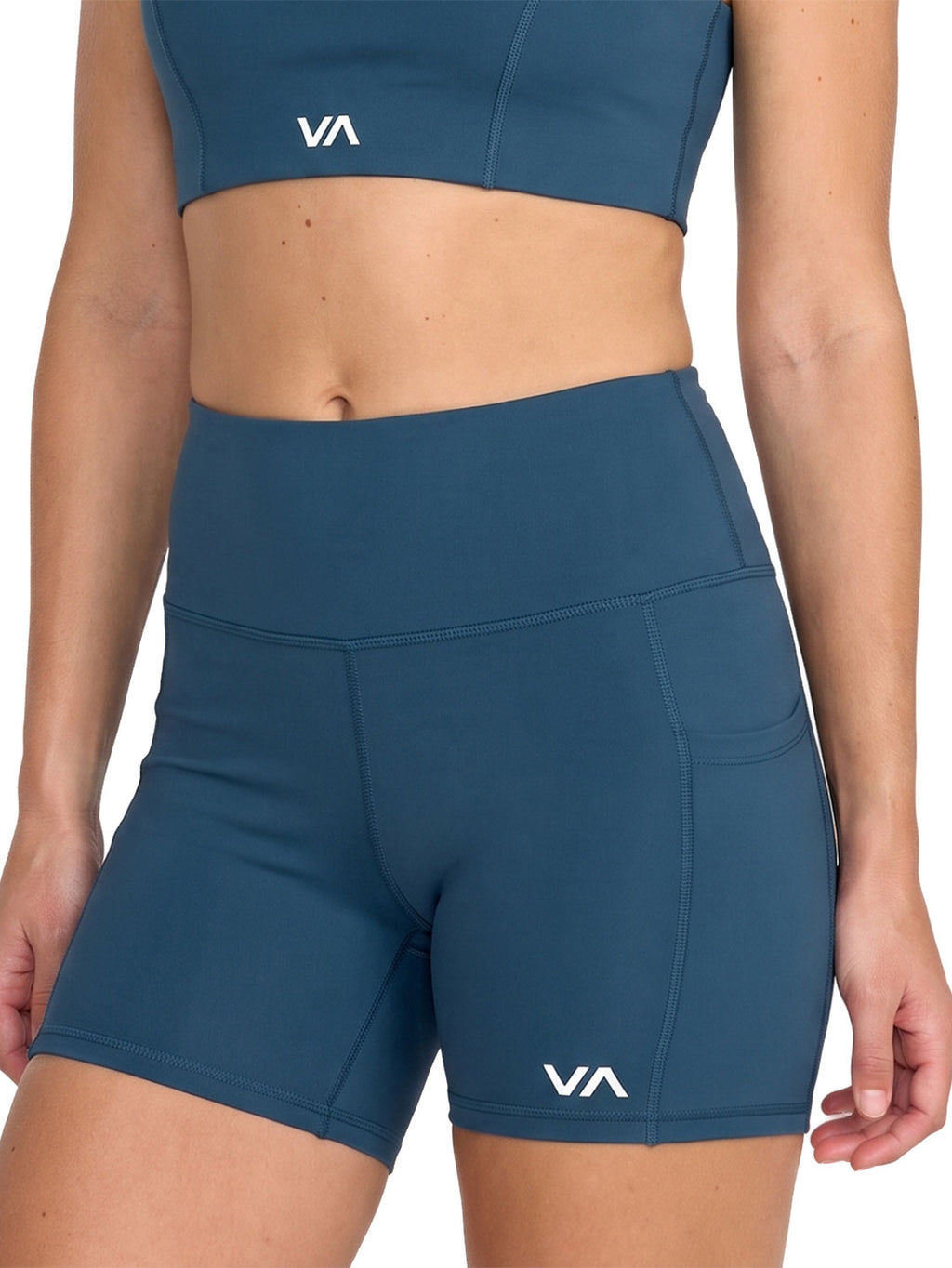 Blue athletic biker shorts with a white 'VA' logo on the lower left leg. Front View