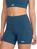 Blue athletic biker shorts with a white 'VA' logo on the lower left leg. Front View