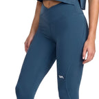 Blue High-waisted athletic leggings with a VA logo. Front Close Up View