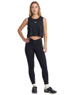 Black sleeveless athletic crop top with small front logo. Front Full Body View