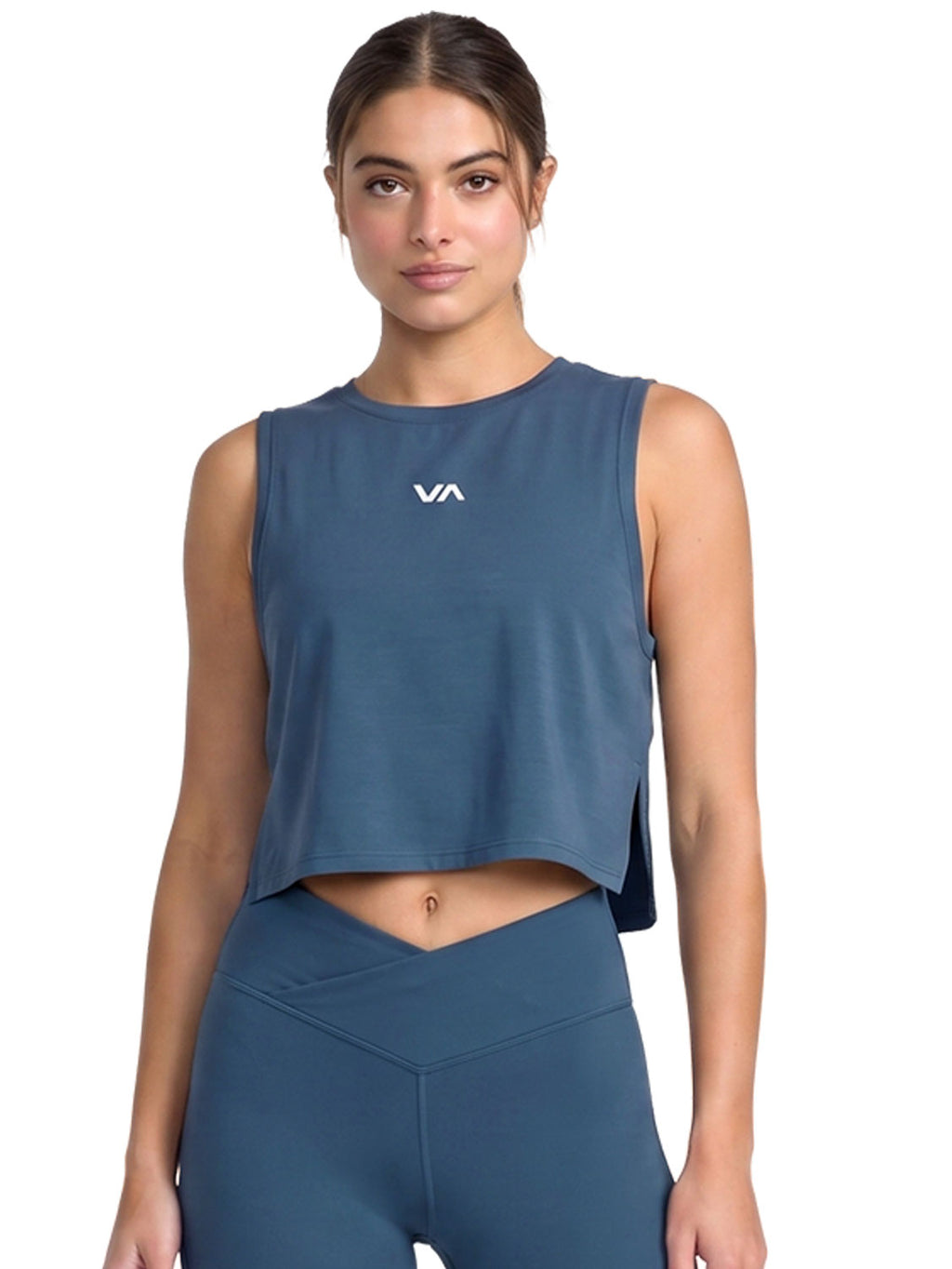 Blue sleeveless athletic crop top with a small white logo on the chest. Front View