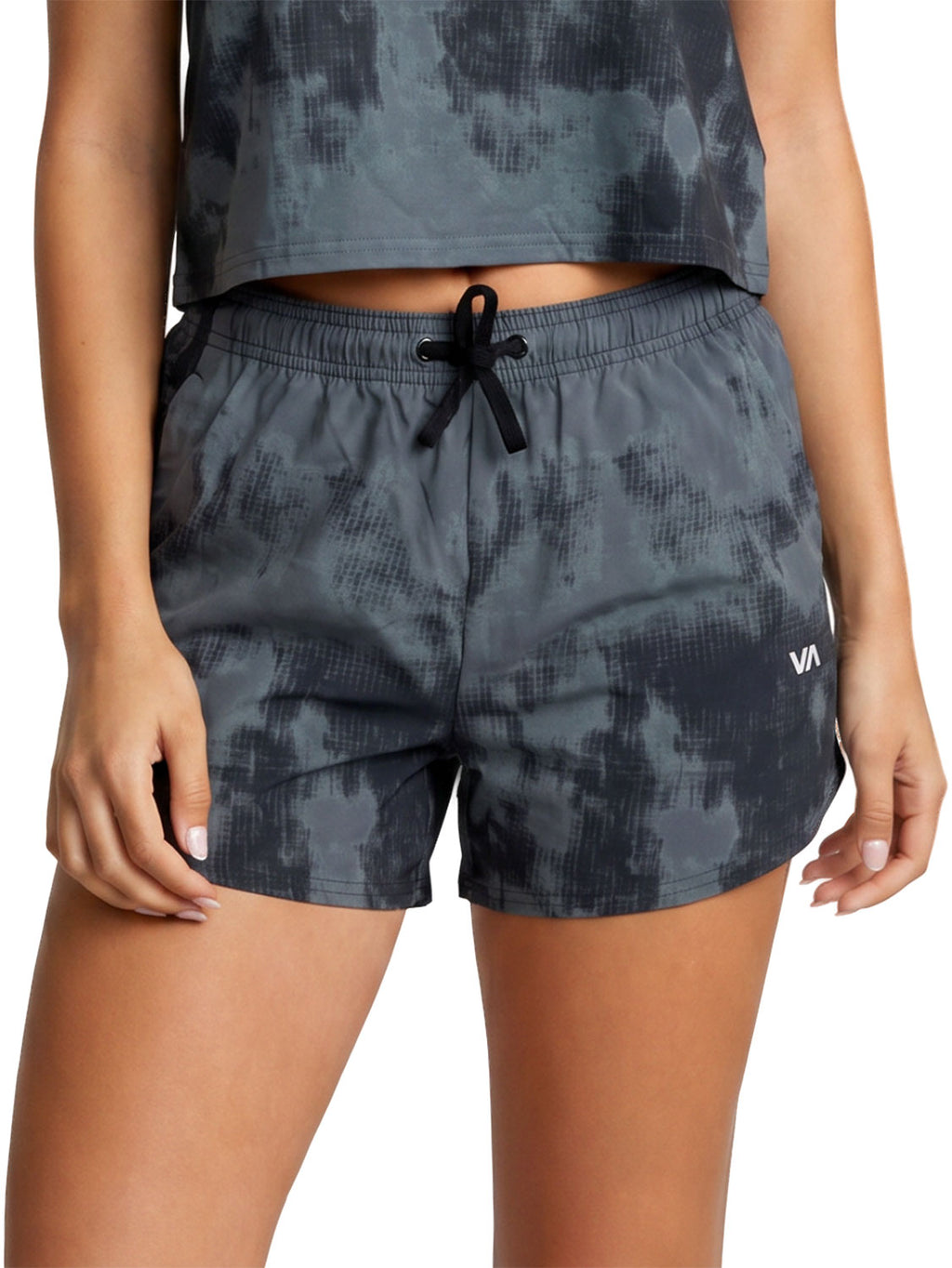 Dark gray and black camouflage athletic shorts with a white RVCA logo on the side. Front View