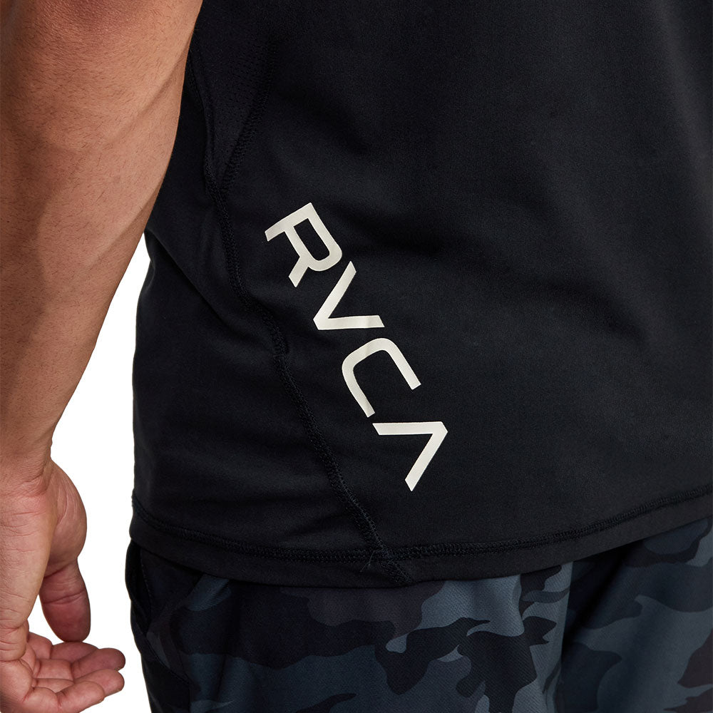 Black athletic t-shirt with a black vertical 'RVCA' logo printed on the lower back. Back Close Up View