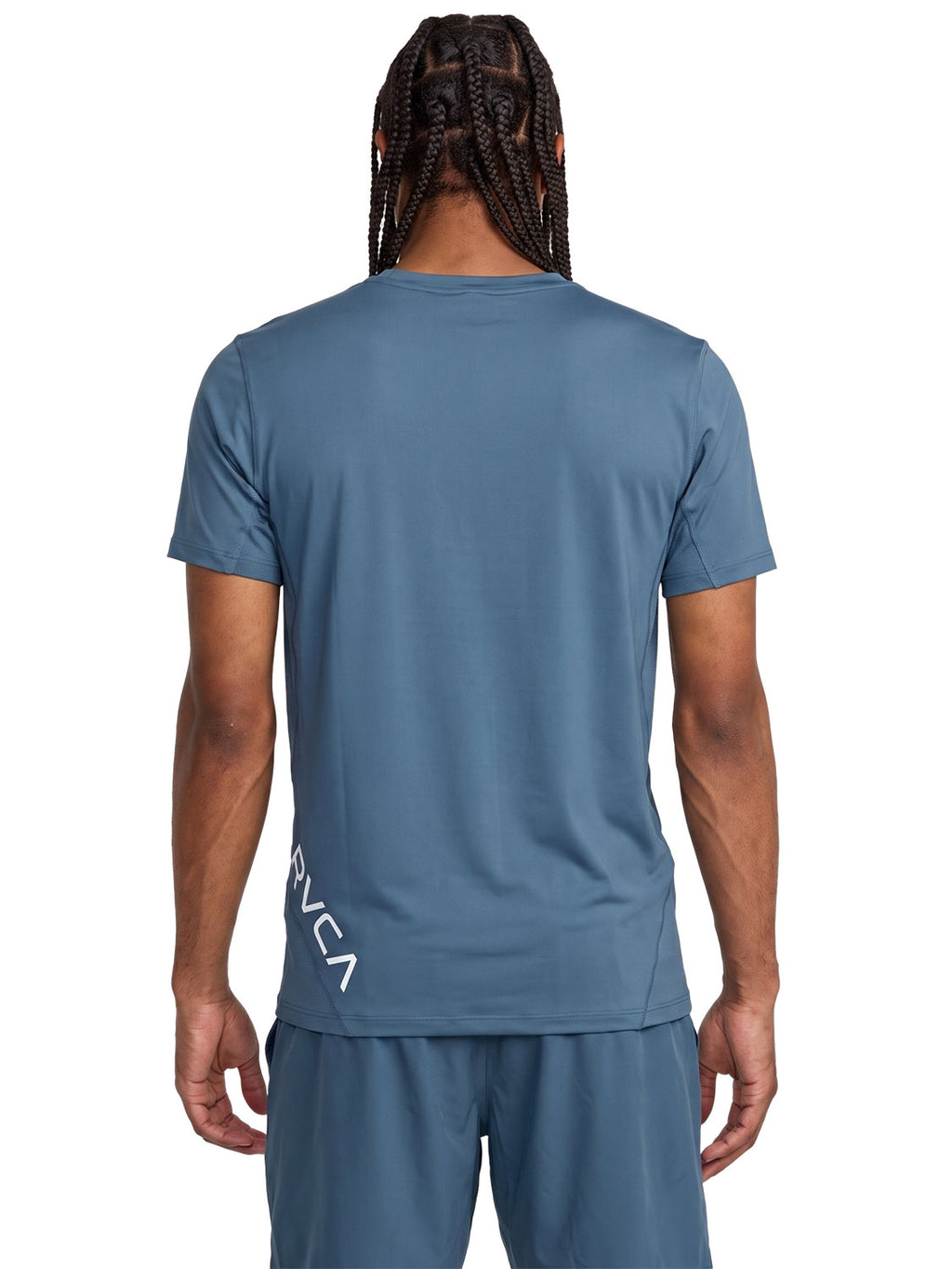 Blue athletic t-shirt with a black vertical 'RVCA' logo printed on the lower back. Back View