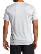 Grey athletic t-shirt with a black vertical 'RVCA' logo printed on the lower back. Back View