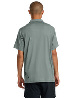 Green short-sleeve polo shirt with a black RVCA logo printed vertically near the lower left side. Back View