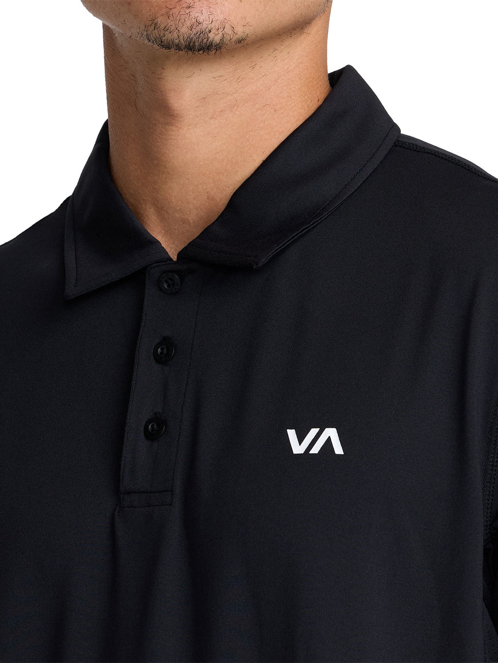 Black short-sleeve polo shirt with a  'VA' logo on the left chest. Front Close Up View