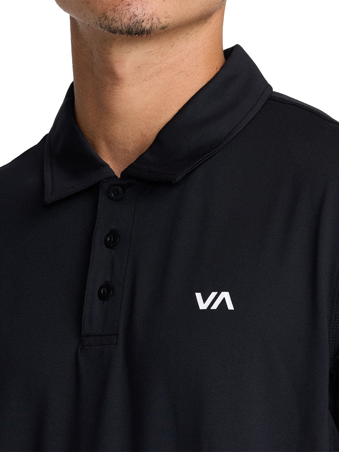 Black short-sleeve polo shirt with a  'VA' logo on the left chest. Front Close Up View