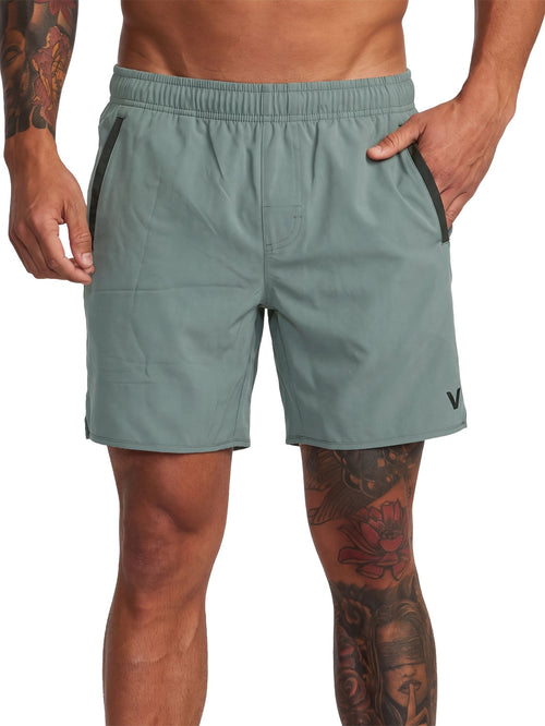 Green athletic shorts featuring a small 'VA' logo on the lower left hem. Front View