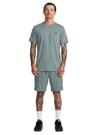 Green athletic shorts with VA hem logo. Front Full View