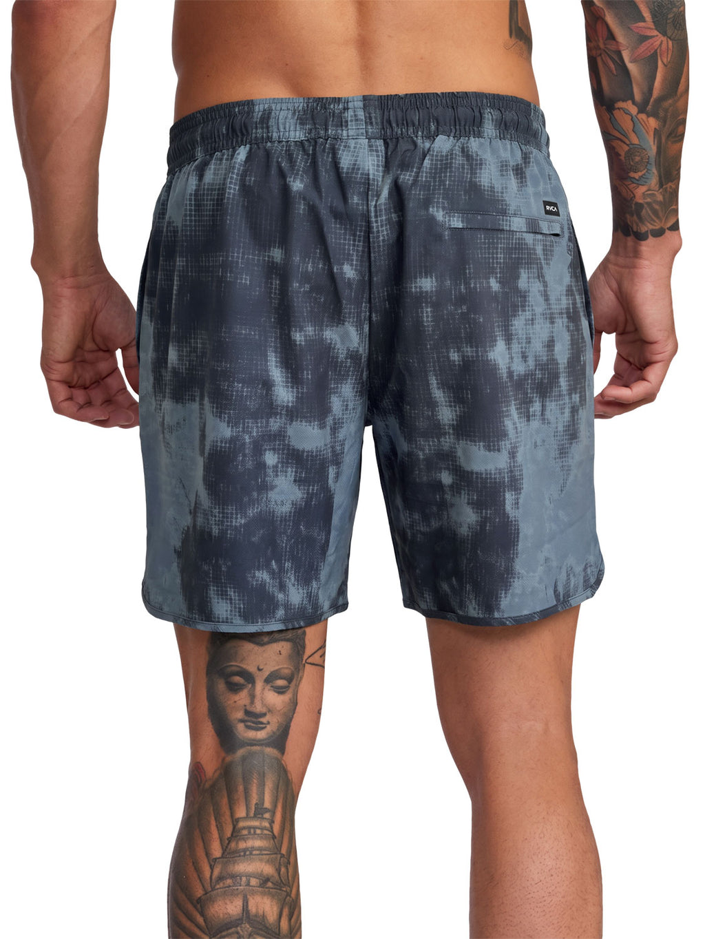 Dark grey tie-dye athletic shorts with a small black logo patch on the back pocket. Back View.