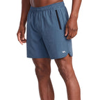 Blue athletic shorts featuring a small 'VA' logo on the lower left hem. Front Side View